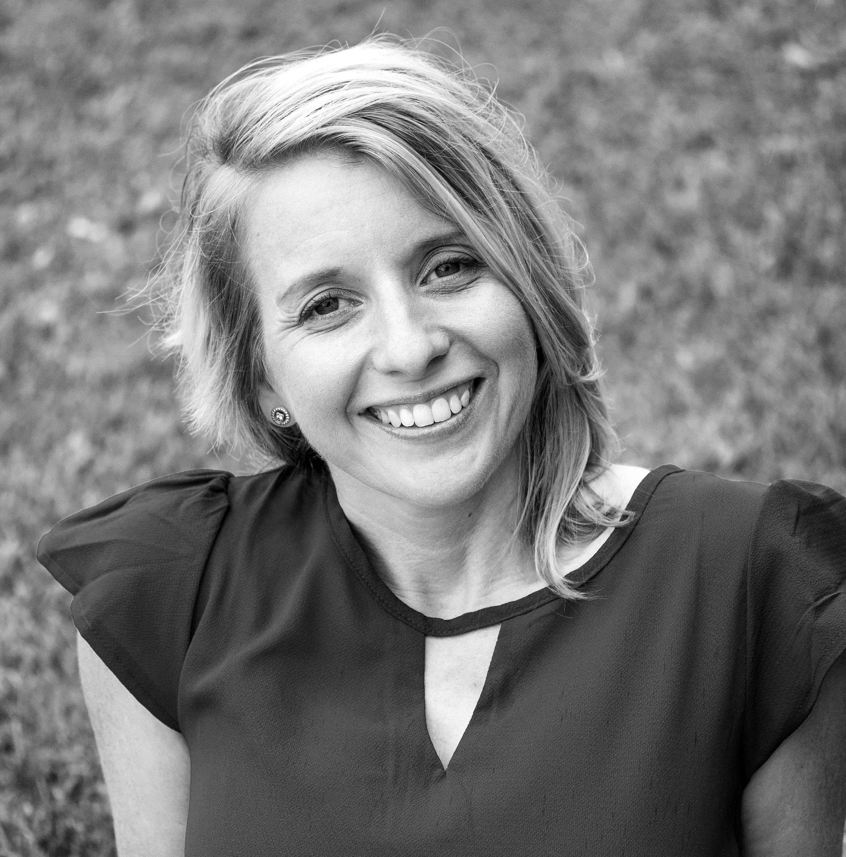 Black and white portrait of a smiling woman