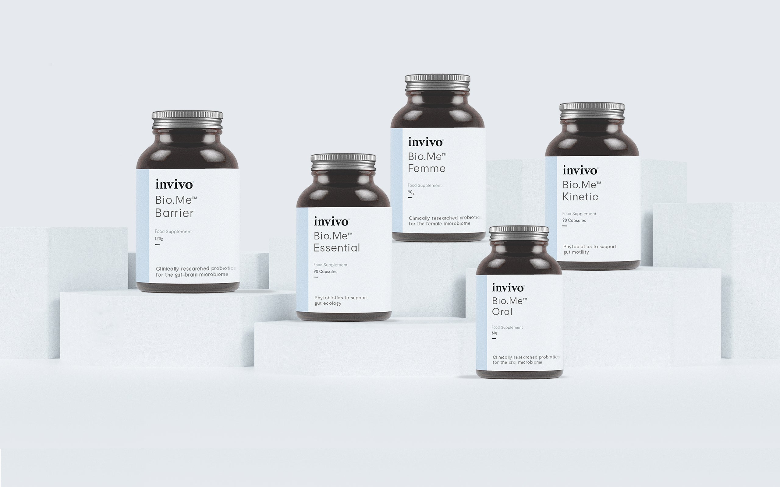 The Invivo Bio.Me and Bio.Clear supplement range displayed on white blocks