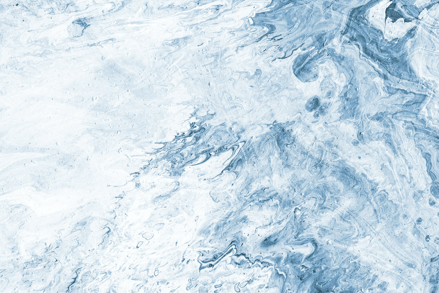 Abstract blue and white marbled water pattern