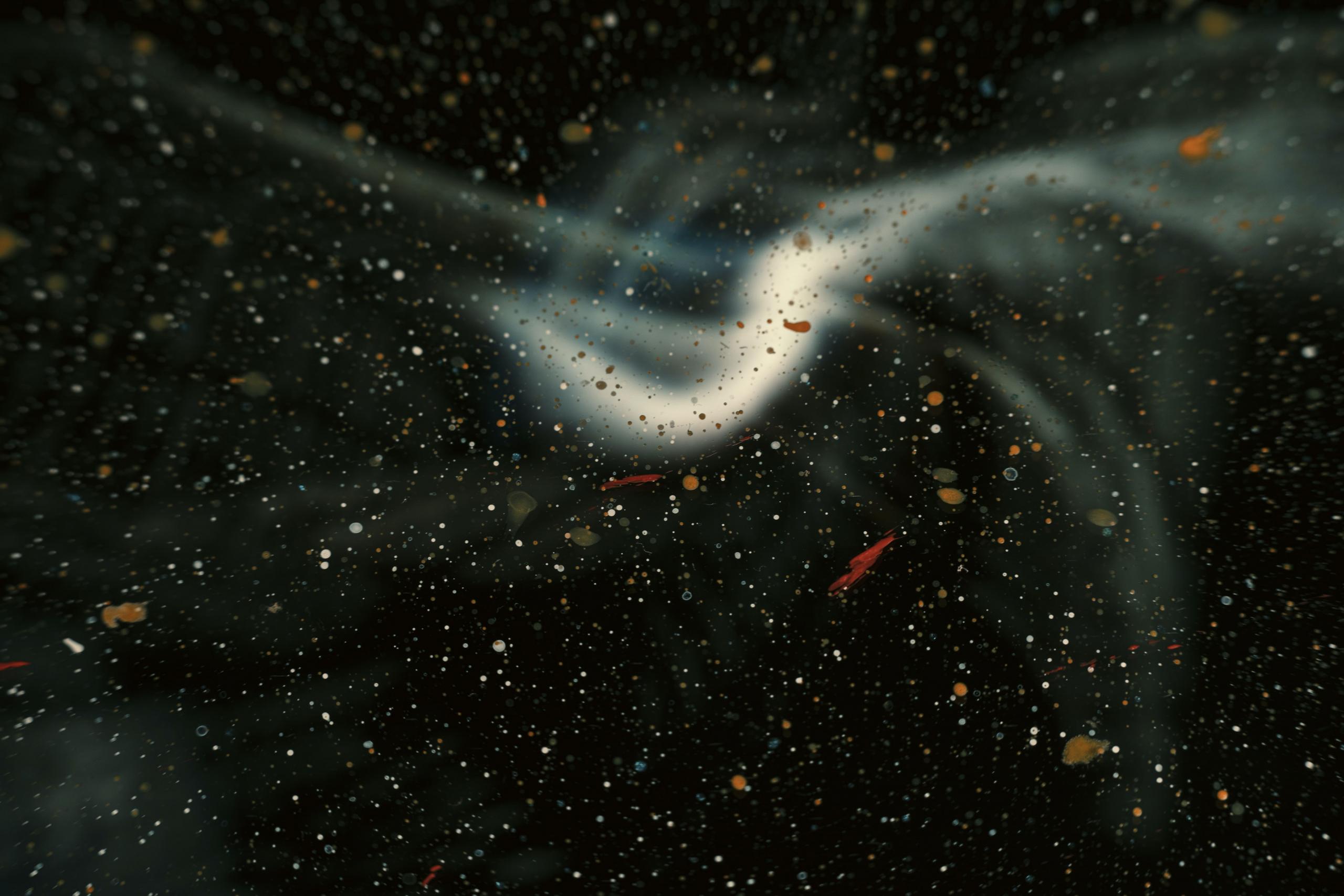Abstract smoke swirl on a dark background