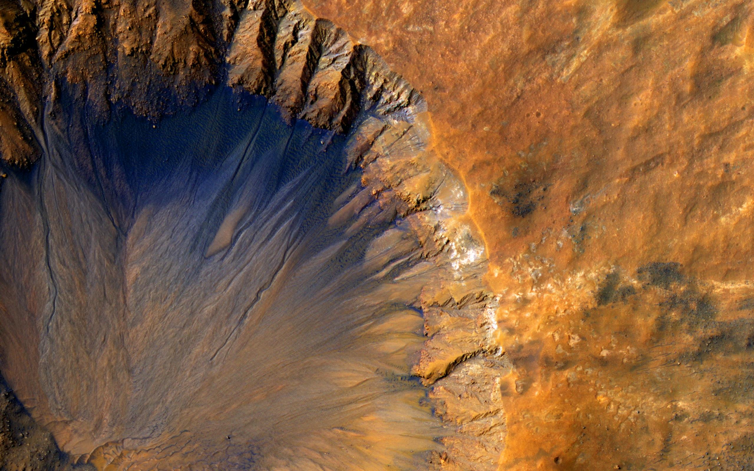 Aerial view of an orange crater