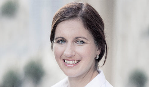 Portrait of a smiling woman with dark hair