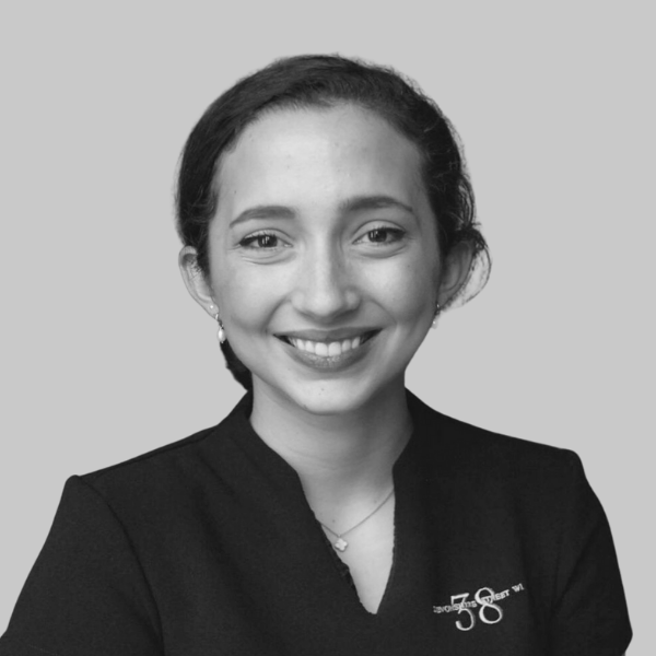 Black and white portrait of a smiling clinician